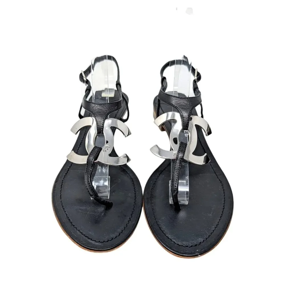 Chanel Big Logo Filigree Thong T-Strap Flat Sandal Black Leather Silver 38 | 7.5